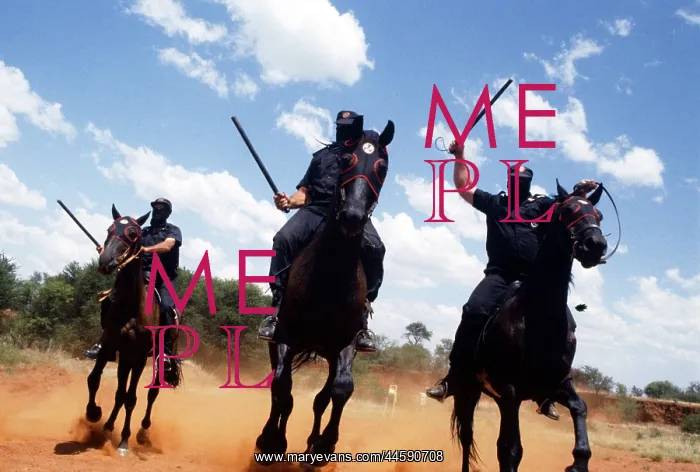 : Iron guard on horseback. Faces obscured by bandanas : Iron guard on horseback. Faces obscured by bandanas
