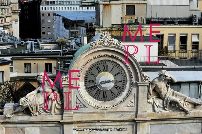 : Italy. Milan. Clock decorated with two statues : Italy. Milan. Clock decorated with two statues