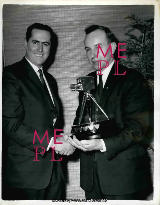 : Jack Brabham with John Surtees, trophy winner : Jack Brabham with John Surtees, trophy winner