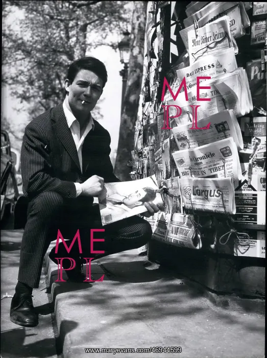 : Jacques Charrier, French actor, with newspaper rack : Jacques Charrier, French actor, with newspaper rack