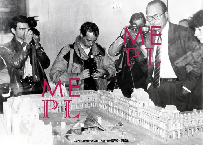 : Jacques Chirac, Mayor of Paris, with Louvre pyramid model : Jacques Chirac, Mayor of Paris, with Louvre pyramid model
