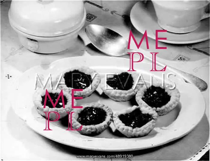  : JAM TARTS. Delicious home-made jam tarts served on a plate