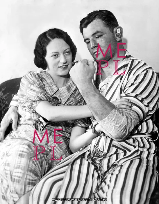 : James Braddock shows off to wife May the ? : James Braddock shows off to wife May the ?
