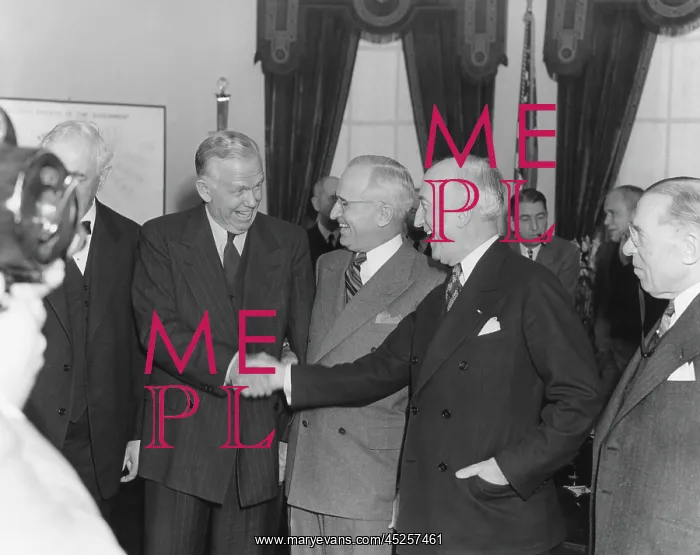 : James Byrnes (right) congratulating George Marshall : James Byrnes (right) congratulating George Marshall