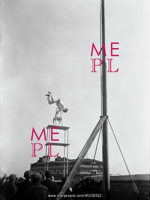 : Jammie Reynolds, balancing on the on chairs on : Jammie Reynolds, balancing on the on chairs on