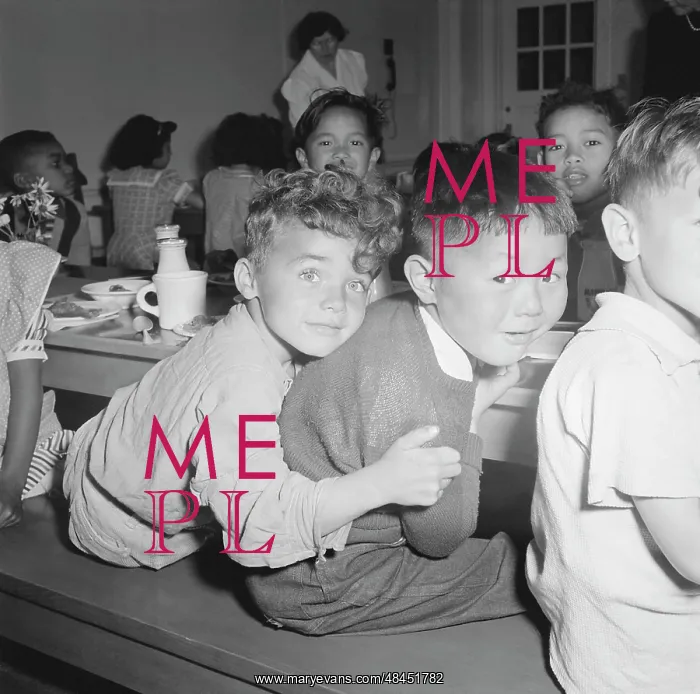 : A Japanese-American boy gets a hug from his : A Japanese-American boy gets a hug from his