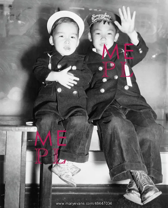 : Two Japanese-American boys wait for a bus : Two Japanese-American boys wait for a bus