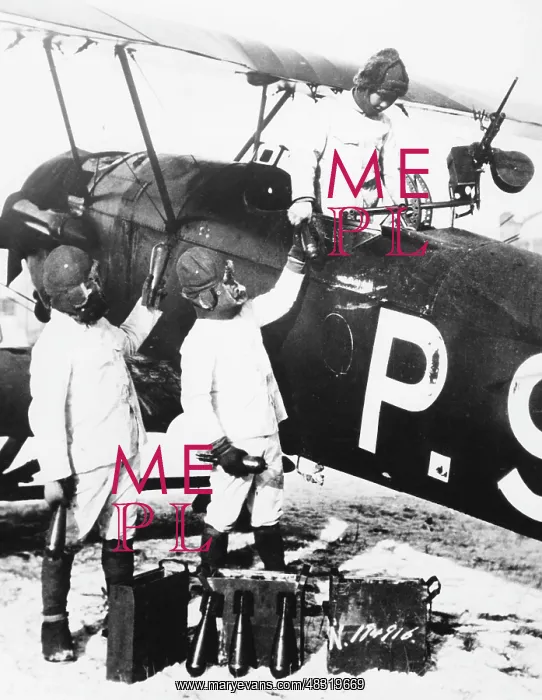 : A Japanese fighter plane is loaded with bombs, 1932 : A Japanese fighter plane is loaded with bombs, 1932