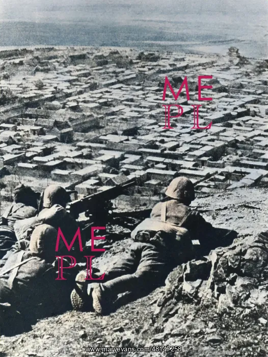 : Japanese machine gunners overlook town : Japanese machine gunners overlook town