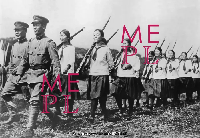 : Japanese schoolgirls doing weapons training : Japanese schoolgirls doing weapons training