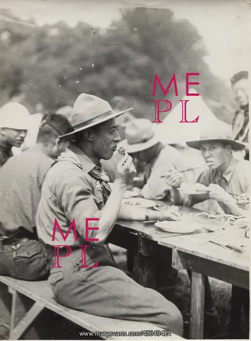 : Japanese scouts eating at camp : Japanese scouts eating at camp