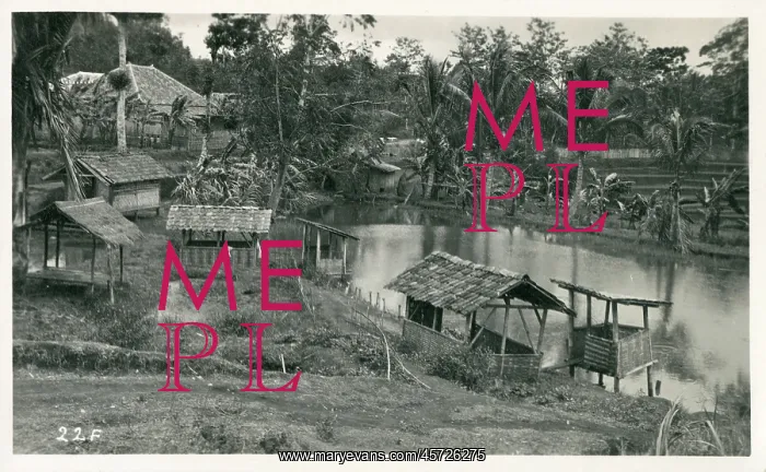 : Java, Indonesia - Small shelters on the riverbank : Java, Indonesia - Small shelters on the riverbank