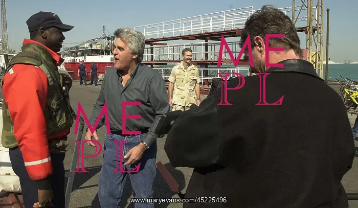 : Jay Leno greets sailors at an undisclosed ? : Jay Leno greets sailors at an undisclosed ?