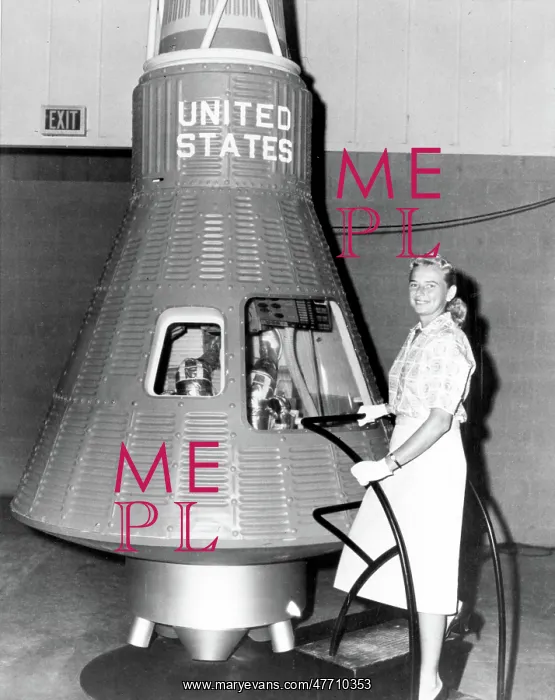 : Jerrie Cobb Poses with Mercury Capsule : Jerrie Cobb Poses with Mercury Capsule
