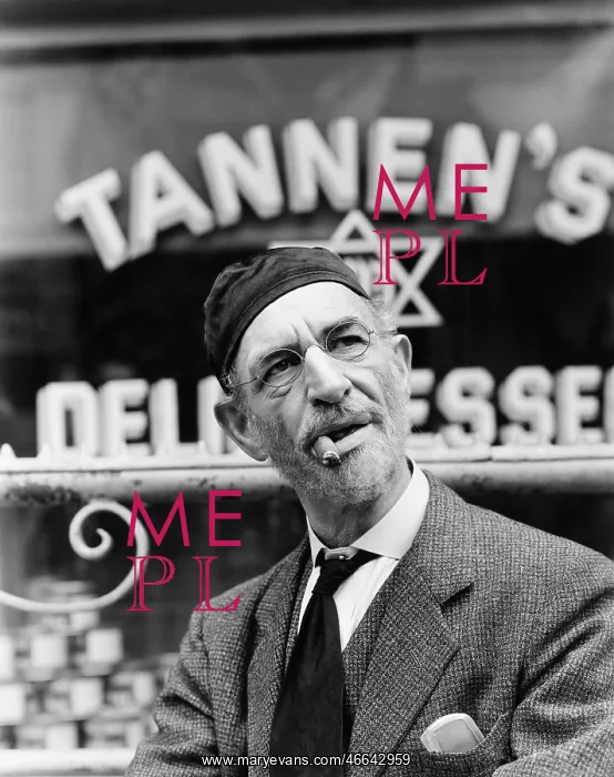  : Jewish man standing in front of a storefront