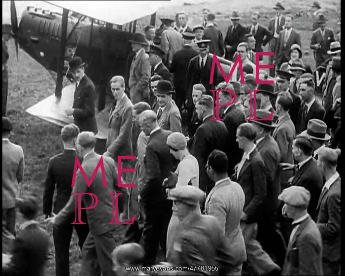 : Jim Mollison Walking to His Plane With a Large Crowd : Jim Mollison Walking to His Plane With a Large Crowd