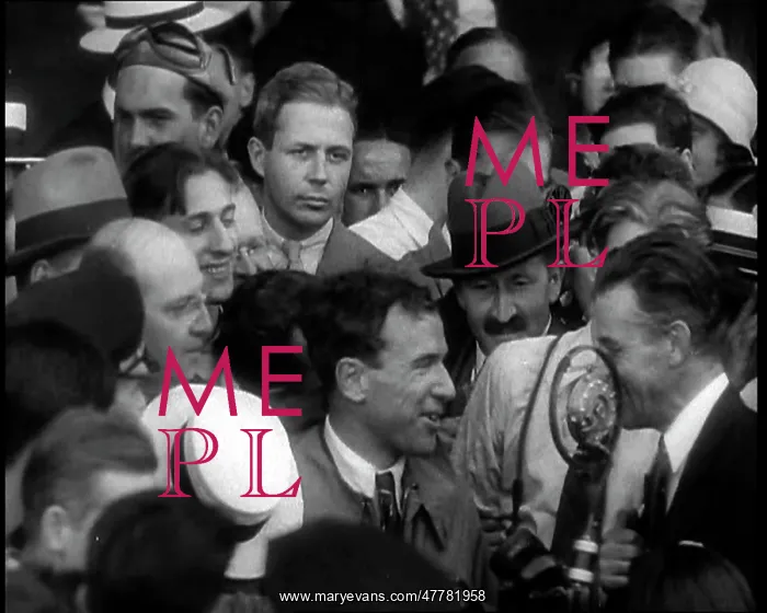 : Jim Mollison Walking Surrounded by a Large Crowd : Jim Mollison Walking Surrounded by a Large Crowd