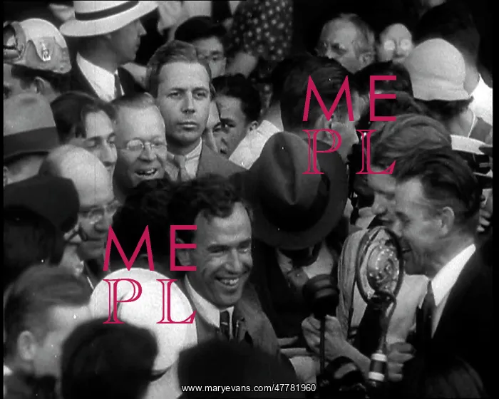 : Jim Mollison Walking Surrounded by a Large Crowd : Jim Mollison Walking Surrounded by a Large Crowd