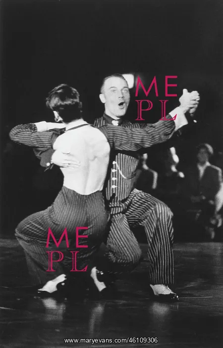 : Jive dancing couple in action : Jive dancing couple in action