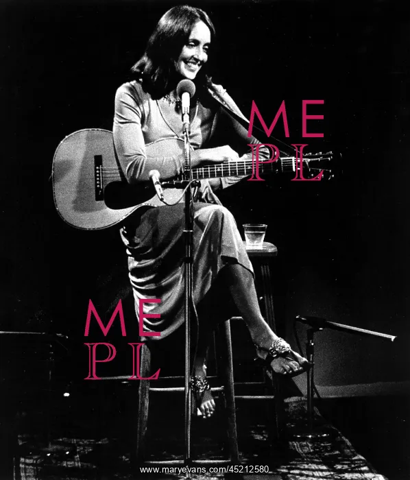 : Joan Baez relaxes between songs during her ? : Joan Baez relaxes between songs during her ?