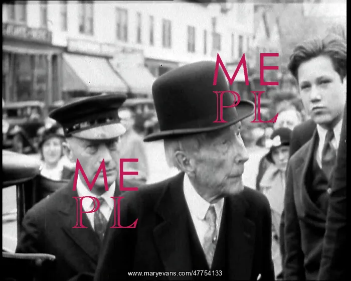  : John D Rockefeller in a Suit and Hat Getting