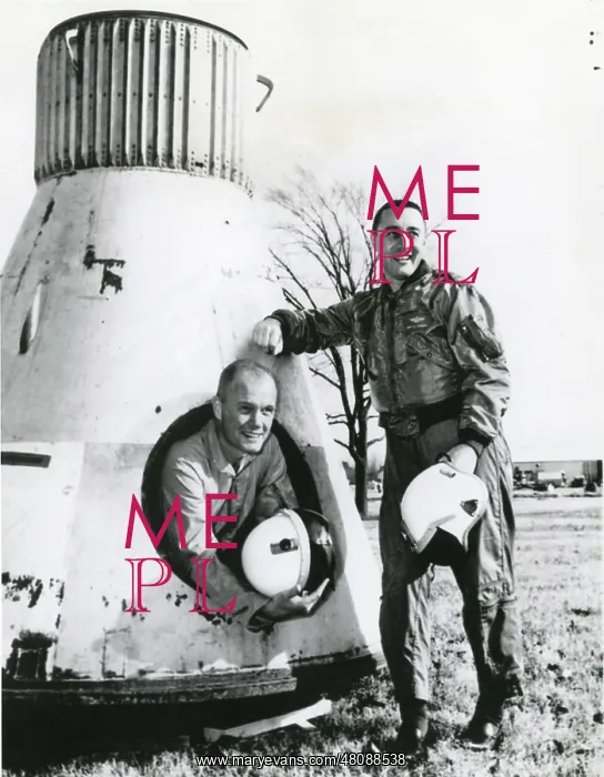: John Glenn and Virgil Grissom pose beside Mercury spacecraft : John Glenn and Virgil Grissom pose beside Mercury spacecraft