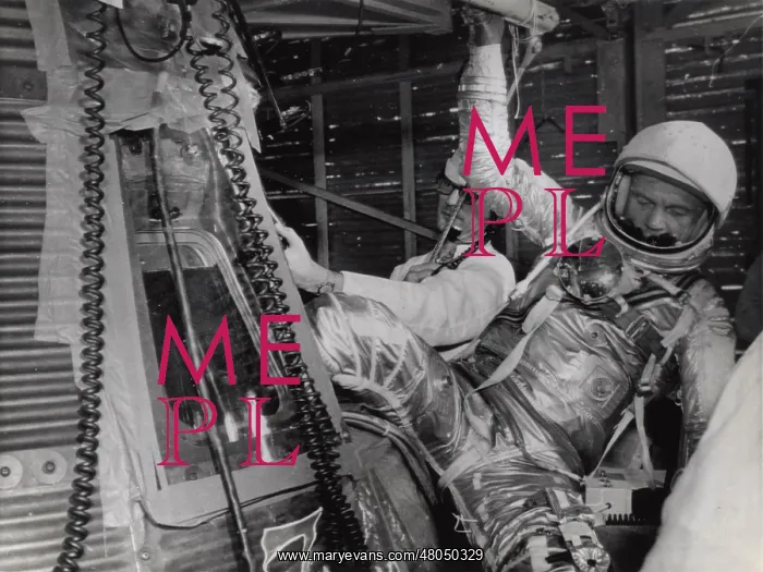 : John H Glenn climbs out of his Mercury space capsule : John H Glenn climbs out of his Mercury space capsule