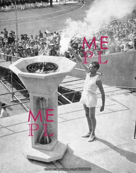 : John Mark lights the Olympic bowl, opening ceremony, 1948 : John Mark lights the Olympic bowl, opening ceremony, 1948