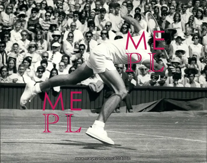 : John Newcombe in tennis match at Wimbledon : John Newcombe in tennis match at Wimbledon