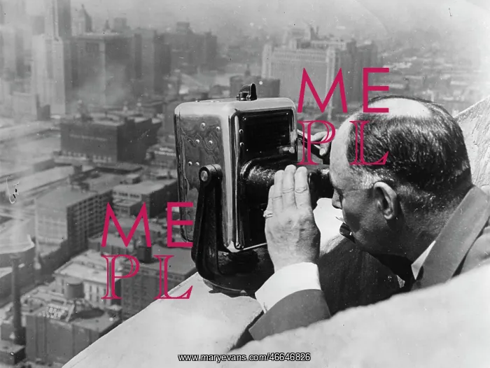 : John S. Fee looks by a dime binoculars : John S. Fee looks by a dime binoculars