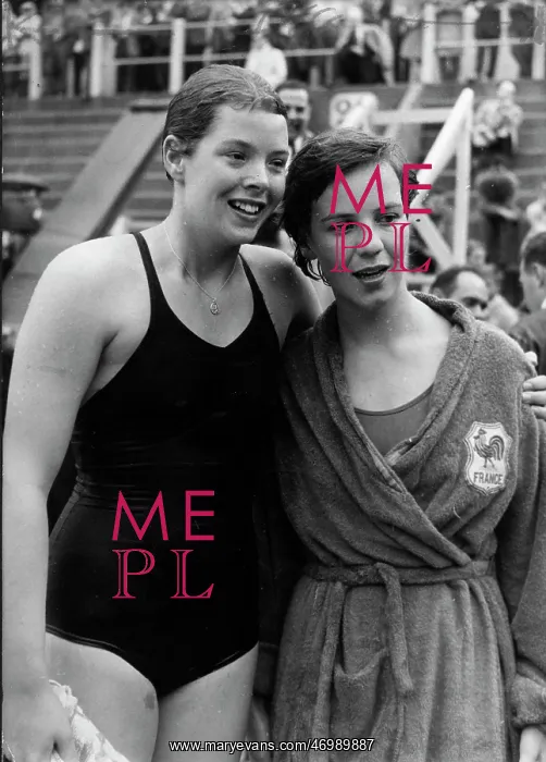 : Judy Grinham with another swimmer after a meet : Judy Grinham with another swimmer after a meet