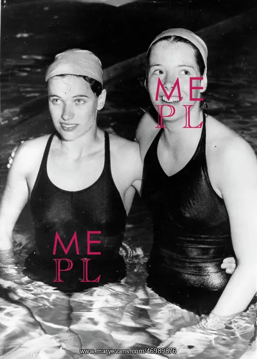 : Judy Grinham and a teammate during practice : Judy Grinham and a teammate during practice