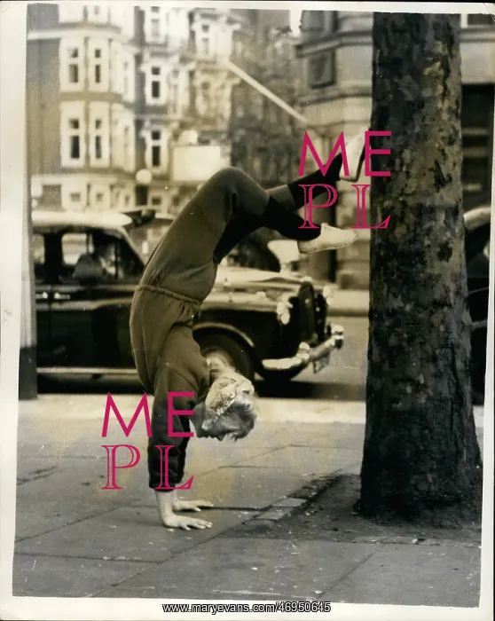 : June Ritchie, actress, doing handstand, London : June Ritchie, actress, doing handstand, London