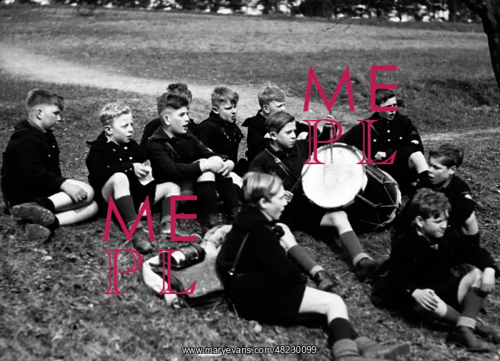 : Jungvolk boys rest during a hike, 1934 : Jungvolk boys rest during a hike, 1934