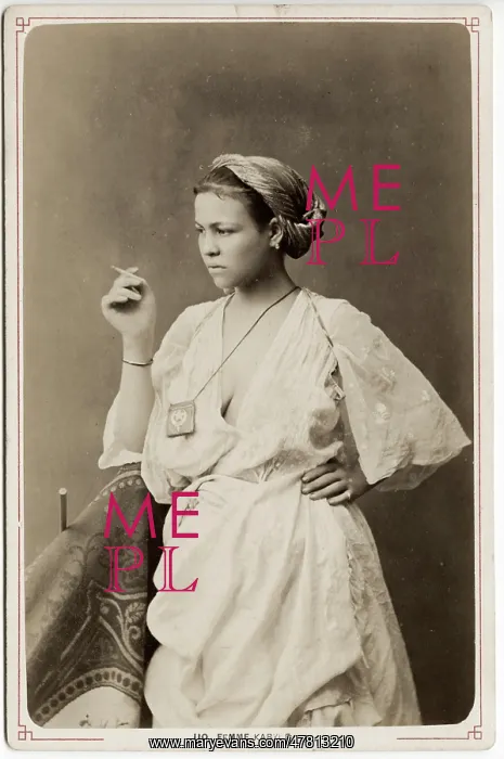 : Kabyle woman with a cigarette. Algeria : Kabyle woman with a cigarette. Algeria