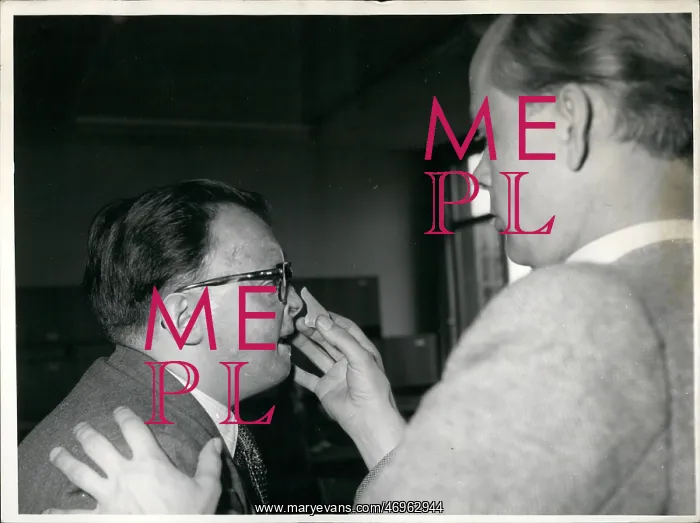 : Karl Heinz Heppe, plastic surgeon, with war victim Basille : Karl Heinz Heppe, plastic surgeon, with war victim Basille