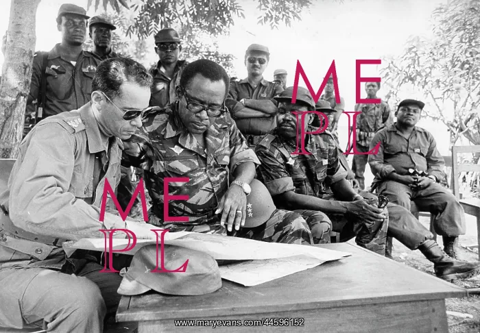 : In Kayembe, Zaire President Mobutu Sese Seko being : In Kayembe, Zaire President Mobutu Sese Seko being