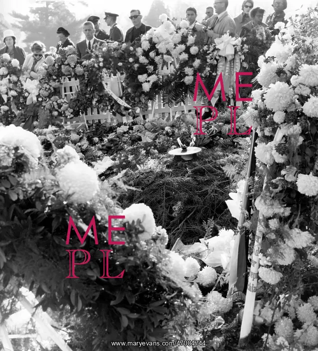 : Kennedy grave surrounded by flowers, Arlington Cemetery : Kennedy grave surrounded by flowers, Arlington Cemetery