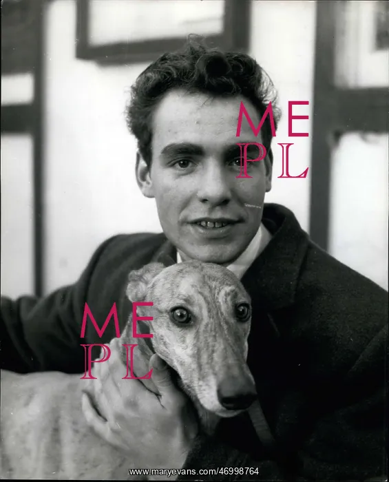: Kennel man with greyhound owned by seven MPs : Kennel man with greyhound owned by seven MPs