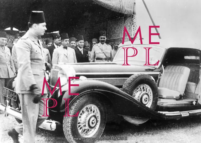 : King Farouk of Egypt with a Mercedes which he received as a : King Farouk of Egypt with a Mercedes which he received as a
