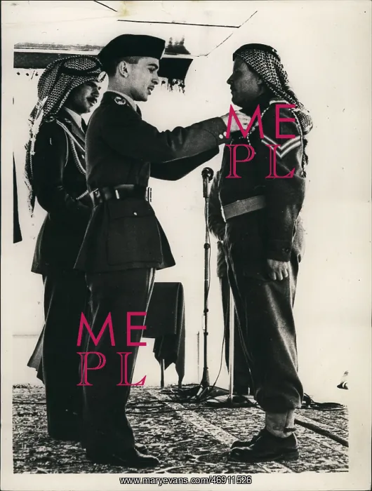 : King Hussein of Jordan presenting a medal : King Hussein of Jordan presenting a medal