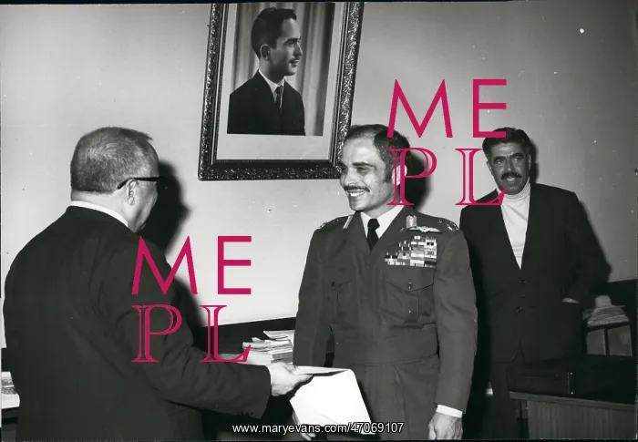 : King Hussein of Jordan with Saudi envoy : King Hussein of Jordan with Saudi envoy