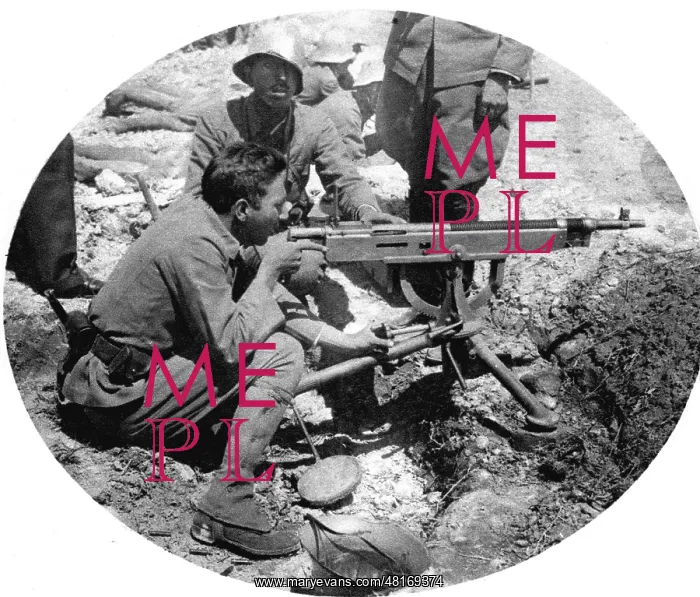 : King Mohammed Zahir at the machine gun : King Mohammed Zahir at the machine gun