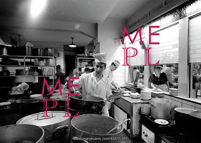 : Kitchen with cooks preparing lunch : Kitchen with cooks preparing lunch