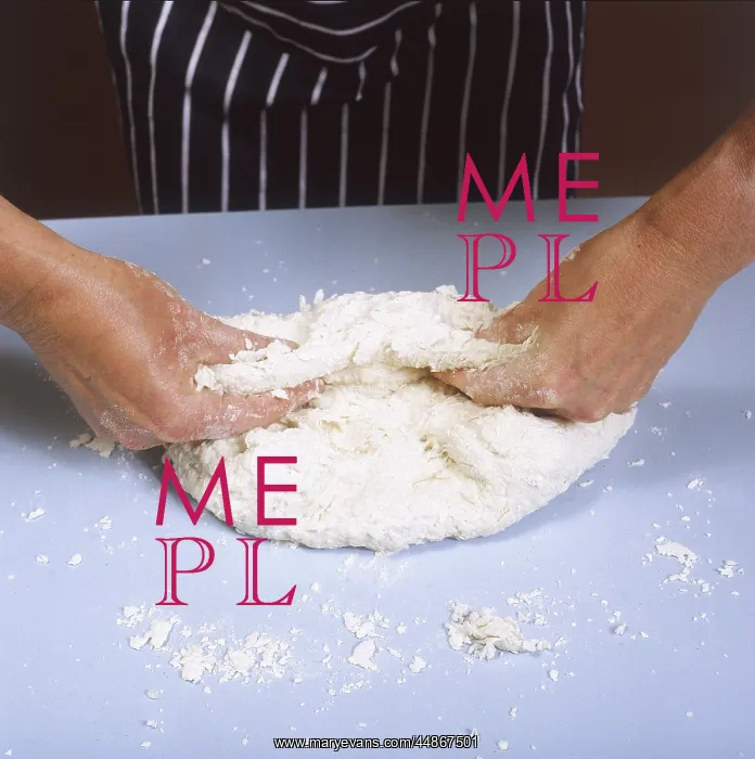  : KNEADING BREAD DOUGH