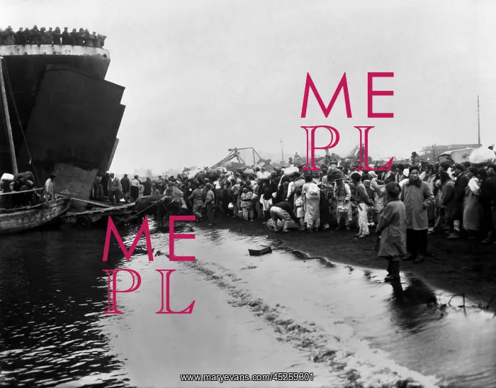 : Korean refugees prepare to board an LST during : Korean refugees prepare to board an LST during