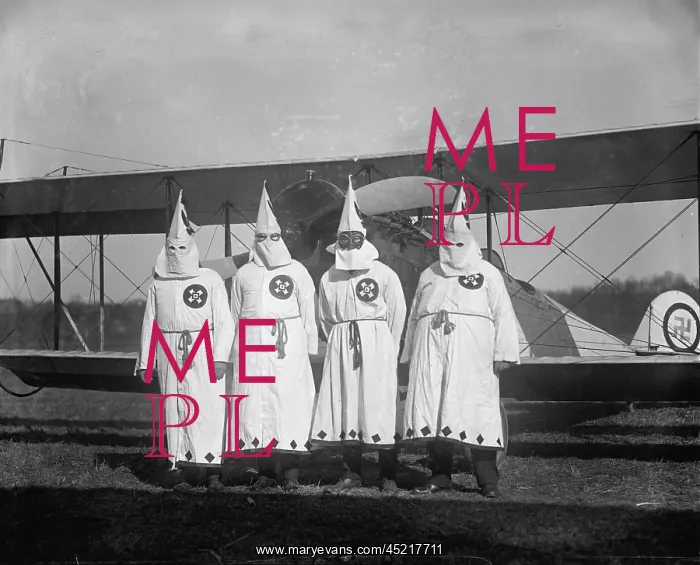  : The Ku Klux Klan, one with flight goggles, ?