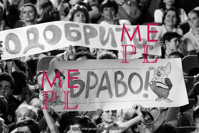 : KVN, 1987. Moscow, USSR. Fans supporting their favourite team during the : KVN, 1987. Moscow, USSR. Fans supporting their favourite team during the