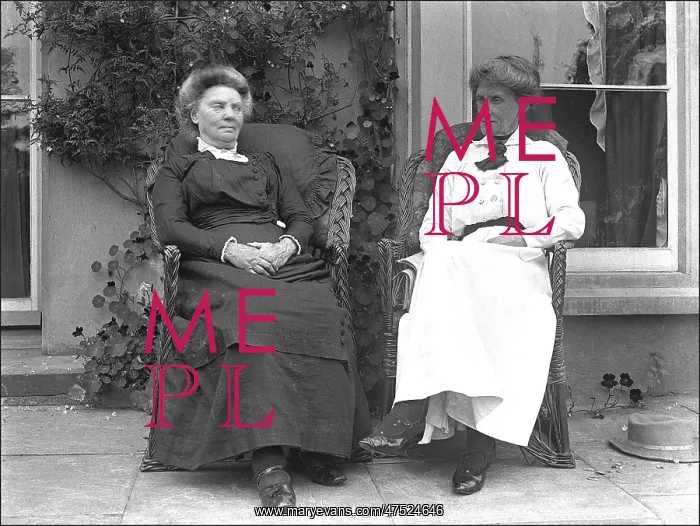 : Two ladies sitting out on the terrace : Two ladies sitting out on the terrace