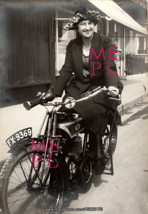 : Lady on a 1915 / 16 Levis motorcycle : Lady on a 1915 / 16 Levis motorcycle